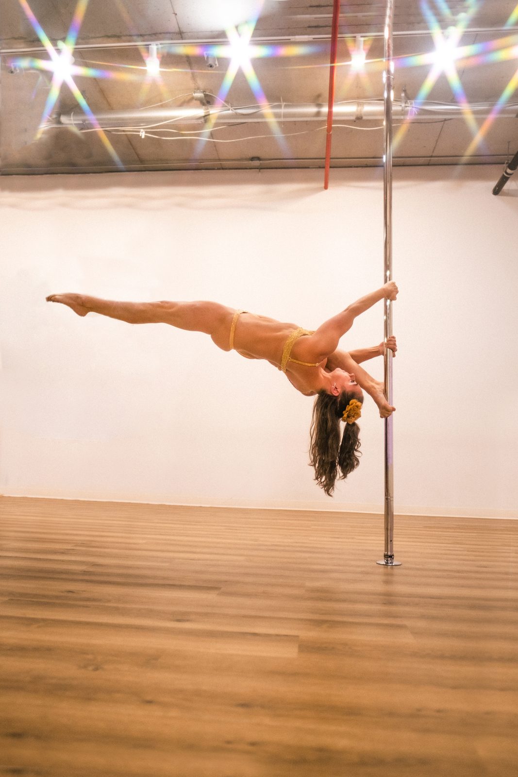 Horizontal pole hold demonstrating strength