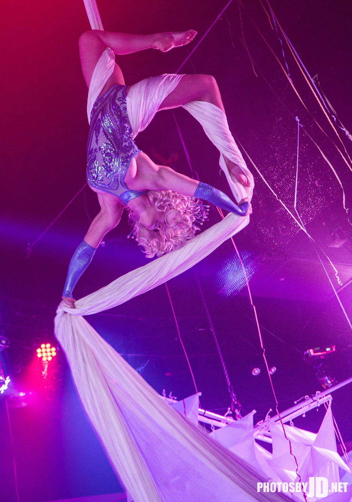 Aerialist performing on aerial silks